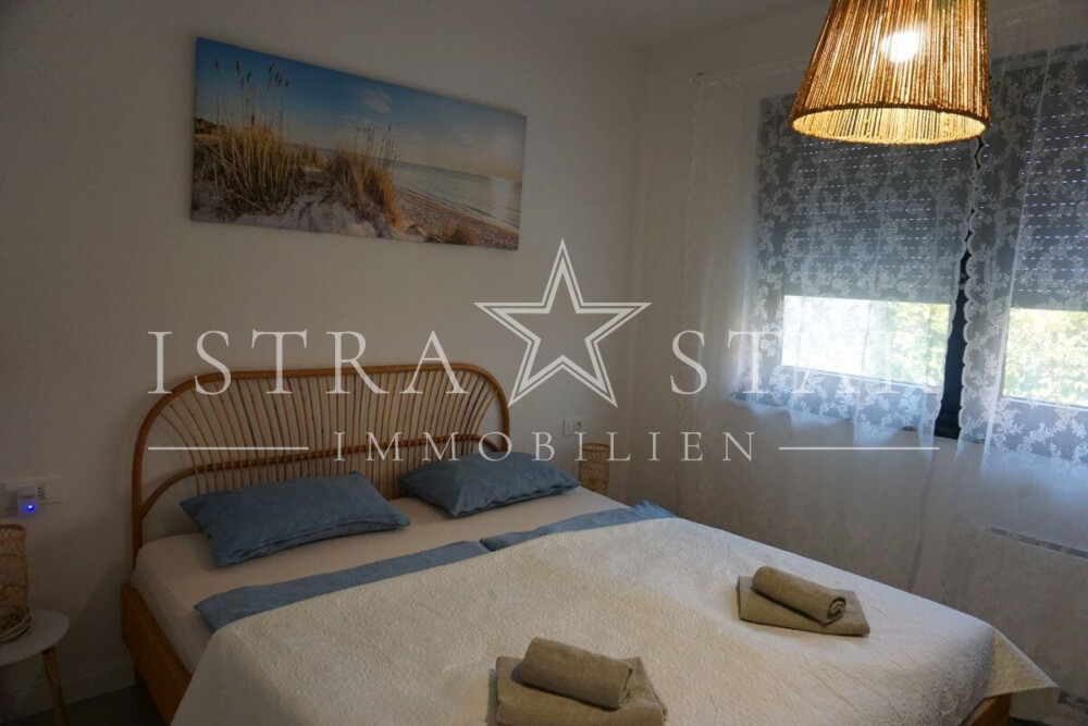 Drei Zimmer Traumwohnung mit Garten und Pool in Porec