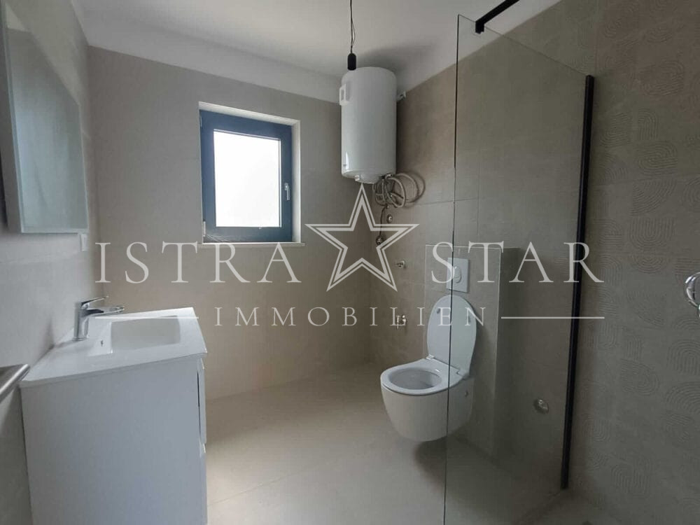 Modernes Vierzimmerapartment im Neubau mit großer Dachterrasse in begehrter Meeresregion