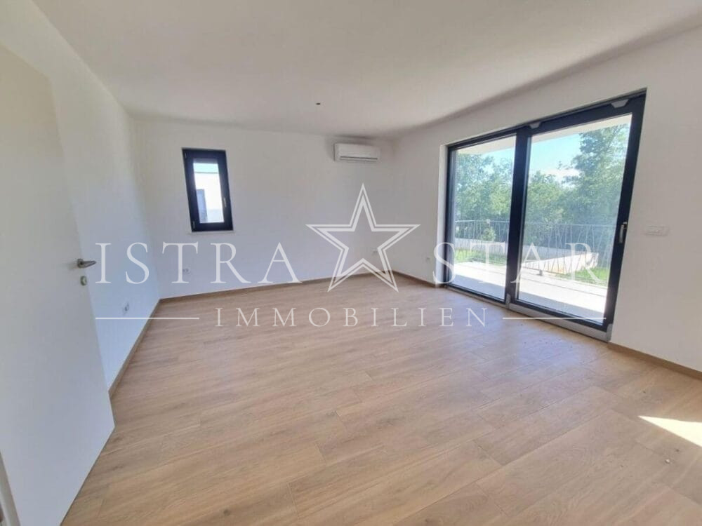Modernes Vierzimmerapartment im Neubau mit großer Dachterrasse in begehrter Meeresregion