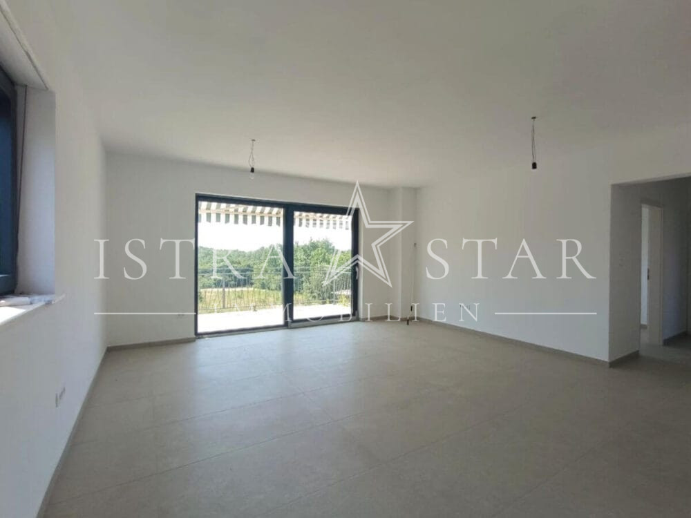 Modernes Vierzimmerapartment im Neubau mit großer Dachterrasse in begehrter Meeresregion