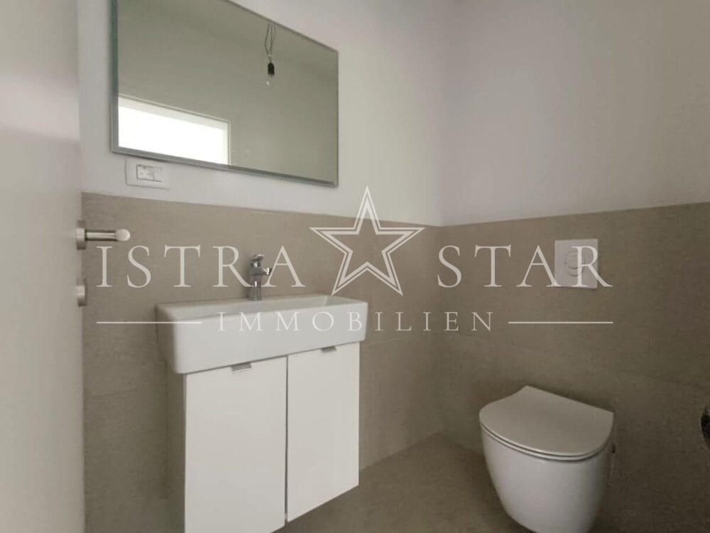 Modernes Vierzimmerapartment im Neubau mit großer Dachterrasse in begehrter Meeresregion