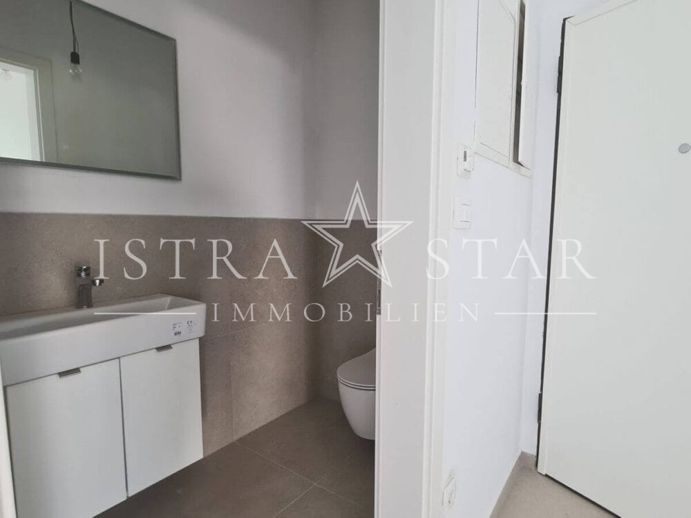 Modernes Vierzimmerapartment im Neubau mit großer Dachterrasse in begehrter Meeresregion