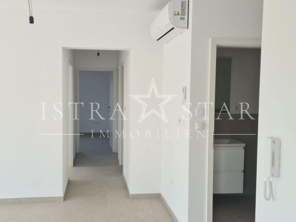 Modernes Vierzimmerapartment im Neubau mit großer Dachterrasse in begehrter Meeresregion