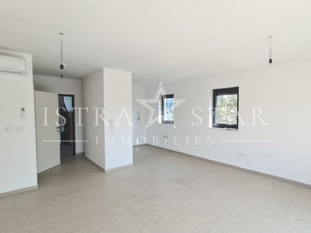 Modernes Vierzimmerapartment im Neubau mit großer Dachterrasse in begehrter Meeresregion