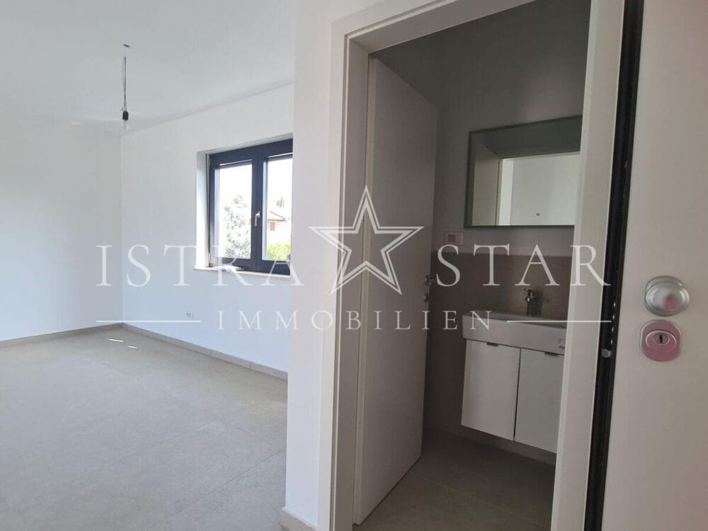 Modernes Vierzimmerapartment im Neubau mit großer Dachterrasse in begehrter Meeresregion