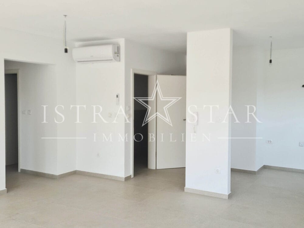 Modernes Vierzimmerapartment im Neubau mit großer Dachterrasse in begehrter Meeresregion